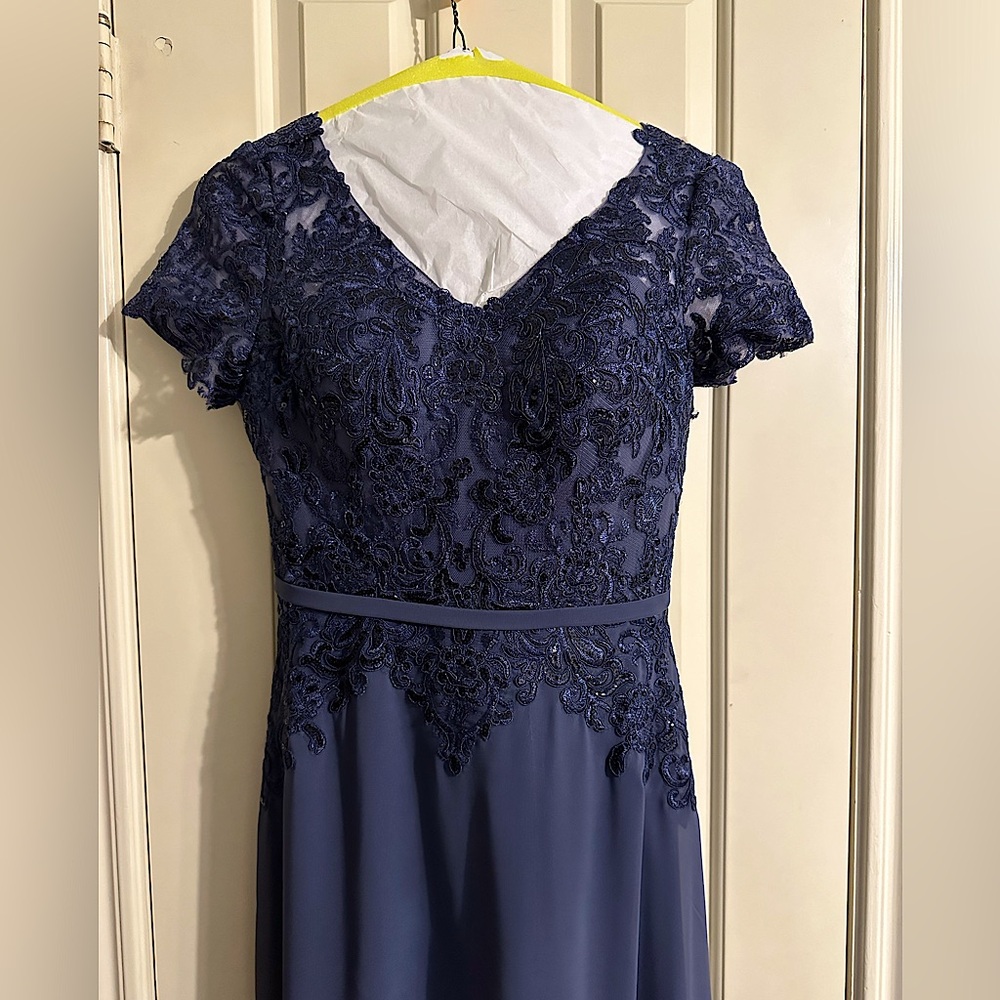 Navy dress. Sheer back with appliqués.